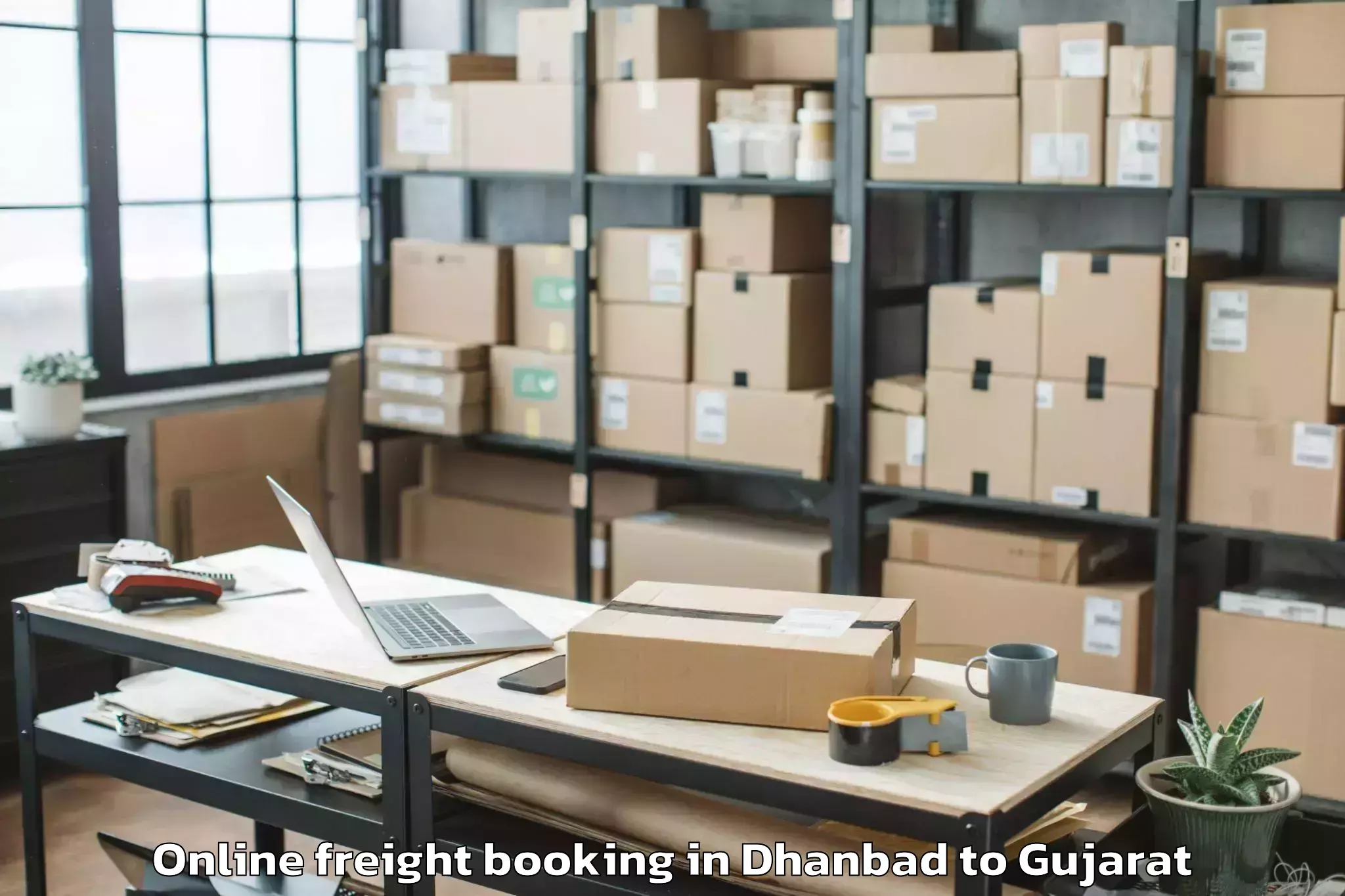 Top Dhanbad to Balasinor Online Freight Booking Available